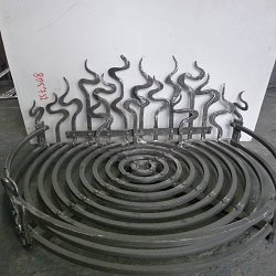 Kovaný rošt do krbu